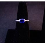 SAPPHIRE + DIAMOND RING. TOTAL SAPPHIRE 1.24CT, TOTAL DIAMOND .