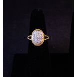 18K YELLOW GOLD PAVE RING. TOTAL DIAMOND .