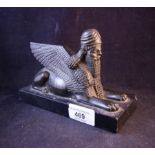 BRONZE FIGURE OF WINGED SPHINX