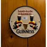 CAST IRON ROUND GUINNESS SIGN