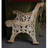 VERY HEAVY ORNATE CAST SEAT ENDS
