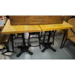 PAIR OF CAST BASE TABLES WITH TIMBER TOPS