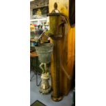ANTIQUE CAST IRON PUMP WITH REEDED COLUMNS.