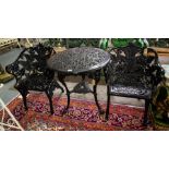 CAST IRON GARDEN TABLE + 2 CAST CHAIRS