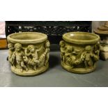 PAIR OF CHERUB POTS.