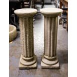 PAIR OF TALL REEDED COLUMNS.