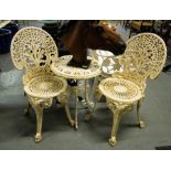 CAST IRON BISTRO TABLE + 2 CAST CHAIRS