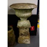 PAIR OF LARGE URNS ON PLINTHS 100CM