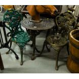 CAST IRON TABLE + 2 CAST ROSE BACK CHAIRS