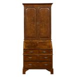 A George I style walnut bureau bookcase