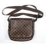 A Louis Vuitton cross-body bag