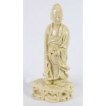 A Chinese Dehua porcelain figure of a young scholar