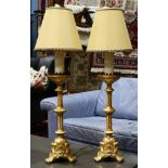 (lot of 2) Continental style parcel gilt carved wood prickets converted as lamps