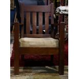 Arts & Crafts style oak arm chair with box spring construction