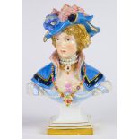 A Meissen porcelain bust of lady with feather