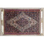 A Persian Hamadan carpet