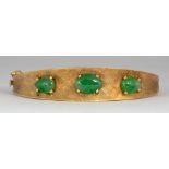 Jadeite and 14k yellow gold bracelet