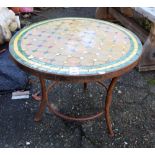 Mosaic tile top round cast iron low table