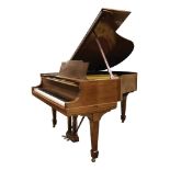A Steinway and Sons Model M baby grand piano