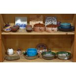 Two shelves of pottery