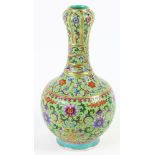 A Chinese turquoise ground garlic bottle vase