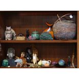Two shelves of decorative art