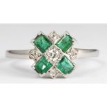 Emerald, diamond, platinum ring