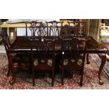 A Chippendale style dining suite