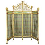 A Mackenzie Childs Rattan three paneled screen