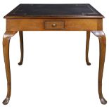 A Chippendale style walnut games table