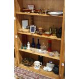 Four shelves of decorative art