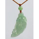 Carved jadeite fish pendant-necklace