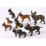 A continental patinated sculpture group of French Bulldogs
