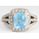 Blue topaz, diamond, 14k white gold ring