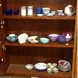 Three shelves of decorative art