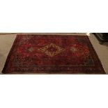 An antique Persian Faraghan Sarouk carpet