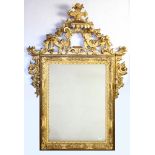 A fine giltwood Venetian mirror