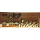 One shelf of brass weights and scale