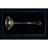 A Gorham Henry II sterling silver punch ladle with gilt wash bowl