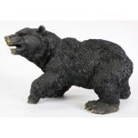 Patinated figural sculpture of a black bear, 14"l