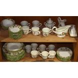 Two shelves with California Metlox Poppy Trial Berry china service: (11) dinner plates; (6)