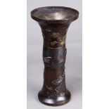 Japanese patinated bronze vase, late Edo-Meiji period, stick neck with flared top, with raised