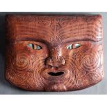 Modern Maori carved wood mask, having inlaid shell eyes, 8.5"h x 10.5"w
