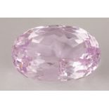 Unmounted Kunzite The unmounted oval-cut kunzite, weighs 15.41 cts.