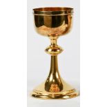 A gilt .800 silver chalice, rising on a knobbed standard with a spreading base, unmarked, 8.5"h,