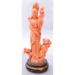A Chinese carved coral figure of beauty with a parrot and a child, size without stand: 8"h x 4"w,