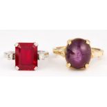 (Lot of 2) Star sapphire, synthetic ruby, gold rings Including 1) star sapphire, 14k yellow gold
