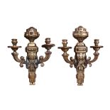 Pair of Neoclassical style gilt wood wall sconces, each having two lights with scrolled arms,