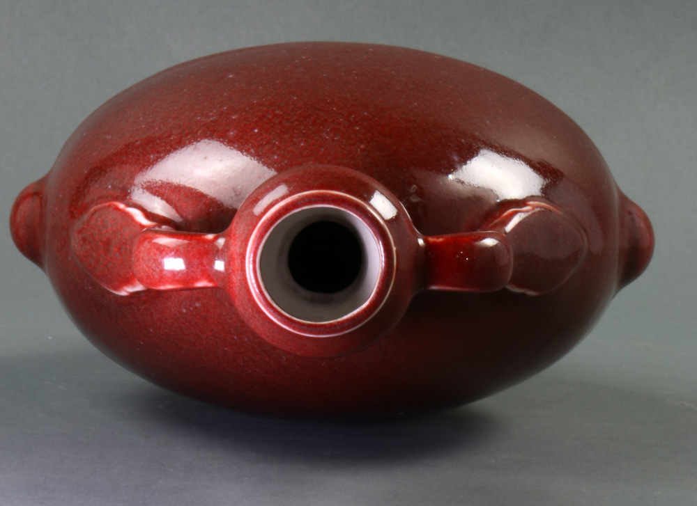 A Chinese copper red glazed porcelain moon-flask vase, of flattened circular shape raised on a low - Image 4 of 5