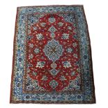 A Persian Mobarakeh carpet, 4'9" x 7'